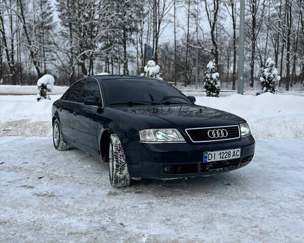 Синій Ауді А6, об'ємом двигуна 2.39 л та пробігом 301 тис. км за 4250 $, фото 1 на Automoto.ua