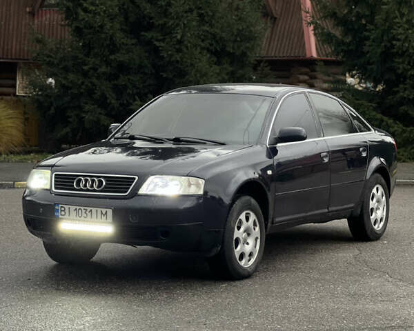 Синий Ауди А6, объемом двигателя 2.5 л и пробегом 328 тыс. км за 3300 $, фото 1 на Automoto.ua