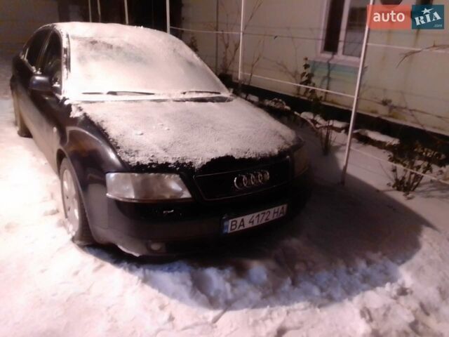 Синий Ауди А6, объемом двигателя 2.39 л и пробегом 315 тыс. км за 4000 $, фото 1 на Automoto.ua