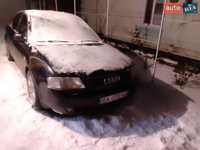Синий Ауди А6, объемом двигателя 2.39 л и пробегом 315 тыс. км за 4000 $, фото 1 на Automoto.ua