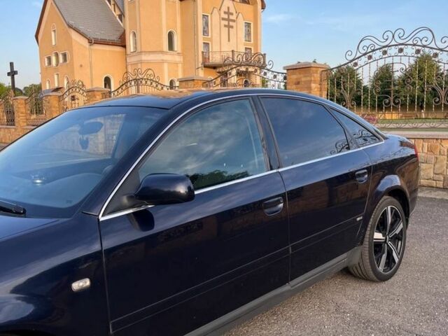 Синий Ауди А6, объемом двигателя 2.5 л и пробегом 270 тыс. км за 5000 $, фото 1 на Automoto.ua