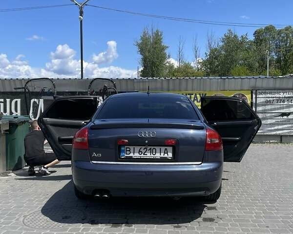 Синий Ауди А6, объемом двигателя 2.5 л и пробегом 444 тыс. км за 4500 $, фото 1 на Automoto.ua
