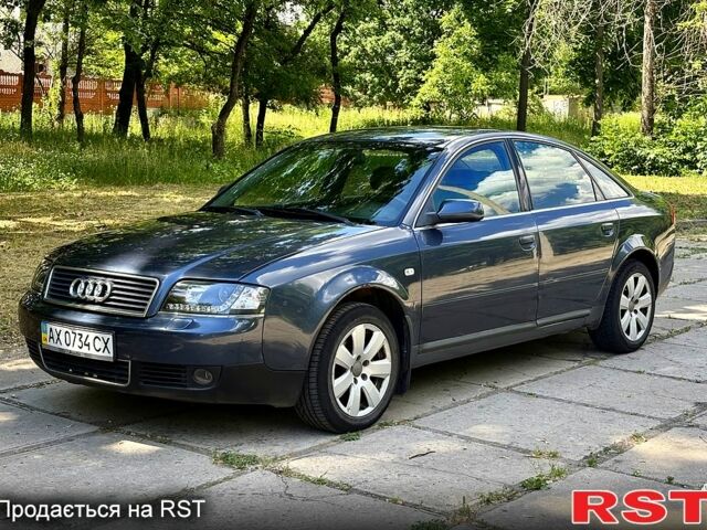 Синий Ауди А6, объемом двигателя 1.9 л и пробегом 306 тыс. км за 4000 $, фото 1 на Automoto.ua