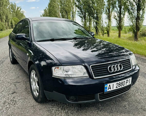 Синий Ауди А6, объемом двигателя 2.5 л и пробегом 389 тыс. км за 4500 $, фото 1 на Automoto.ua