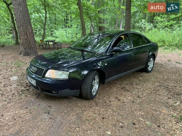 Синий Ауди А6, объемом двигателя 2 л и пробегом 297 тыс. км за 3200 $, фото 1 на Automoto.ua