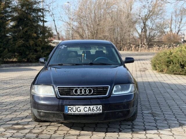 Синий Ауди А6, объемом двигателя 2.5 л и пробегом 280 тыс. км за 2550 $, фото 1 на Automoto.ua