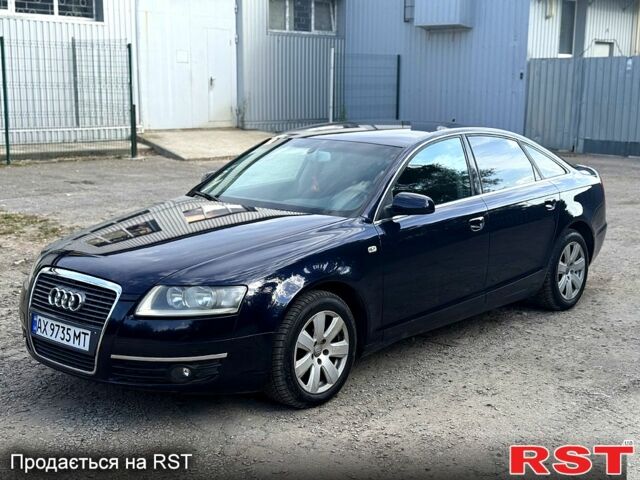 Синий Ауди А6, объемом двигателя 2.4 л и пробегом 200 тыс. км за 6000 $, фото 1 на Automoto.ua