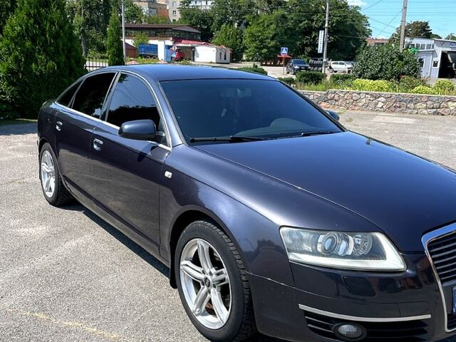 Синий Ауди А6, объемом двигателя 2.4 л и пробегом 228 тыс. км за 6700 $, фото 1 на Automoto.ua
