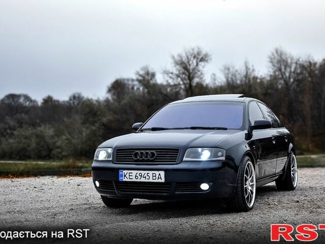 Синий Ауди А6, объемом двигателя 2.4 л и пробегом 246 тыс. км за 6900 $, фото 1 на Automoto.ua