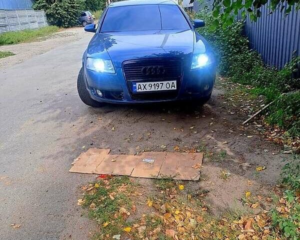 Синий Ауди А6, объемом двигателя 2.4 л и пробегом 314 тыс. км за 7000 $, фото 1 на Automoto.ua