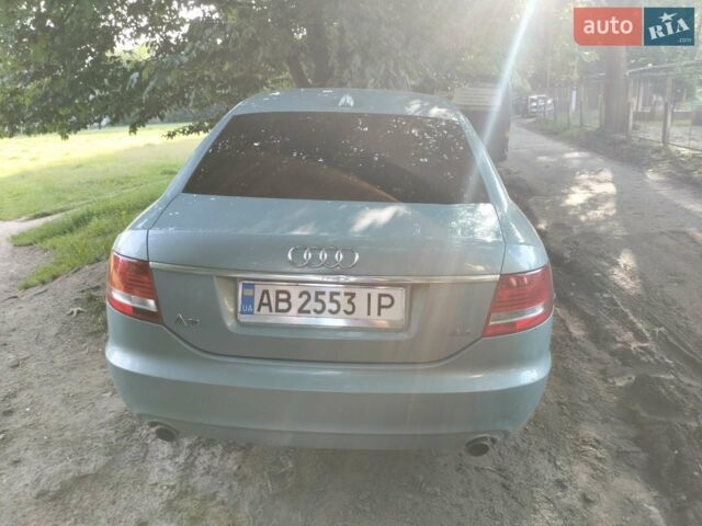 Синий Ауди А6, объемом двигателя 2.39 л и пробегом 253 тыс. км за 6000 $, фото 1 на Automoto.ua