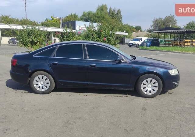 Синий Ауди А6, объемом двигателя 2 л и пробегом 399 тыс. км за 6500 $, фото 1 на Automoto.ua