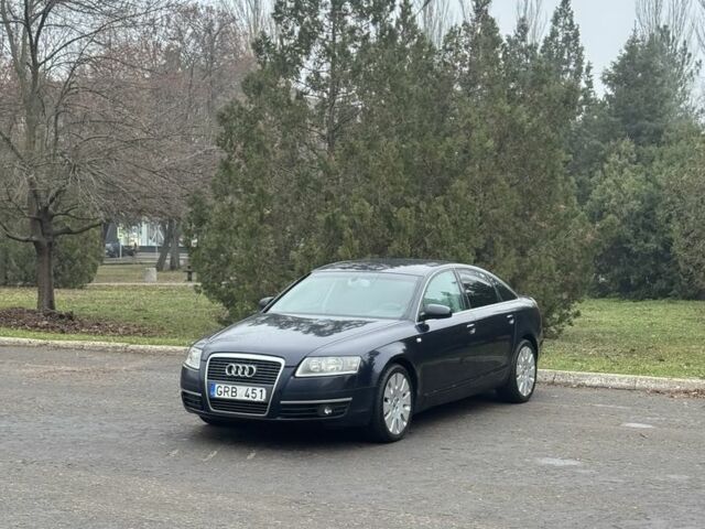 Синий Ауди А6, объемом двигателя 2 л и пробегом 250 тыс. км за 3550 $, фото 1 на Automoto.ua