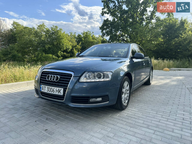 Синий Ауди А6, объемом двигателя 2 л и пробегом 306 тыс. км за 9800 $, фото 1 на Automoto.ua