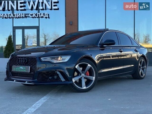 Синій Ауді А6, об'ємом двигуна 1.98 л та пробігом 207 тис. км за 13990 $, фото 1 на Automoto.ua