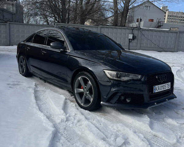 Синій Ауді А6, об'ємом двигуна 2 л та пробігом 207 тис. км за 13650 $, фото 1 на Automoto.ua