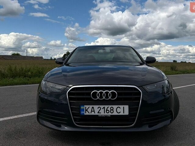 Синій Ауді А6, об'ємом двигуна 2 л та пробігом 198 тис. км за 12200 $, фото 1 на Automoto.ua