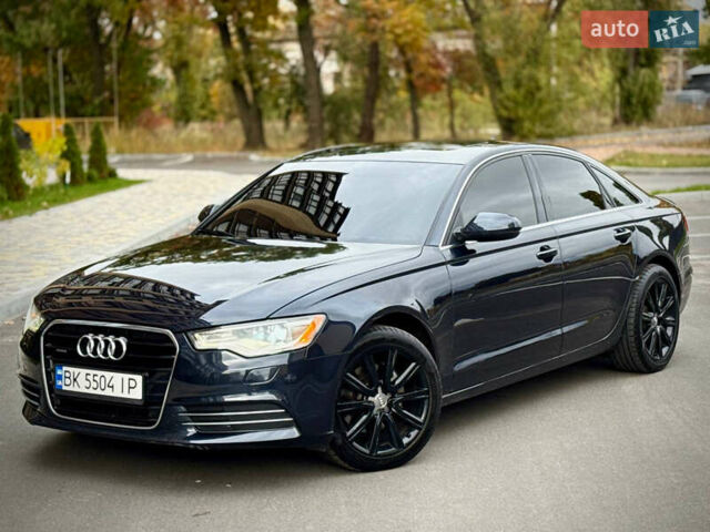 Синий Ауди А6, объемом двигателя 2 л и пробегом 216 тыс. км за 12300 $, фото 1 на Automoto.ua