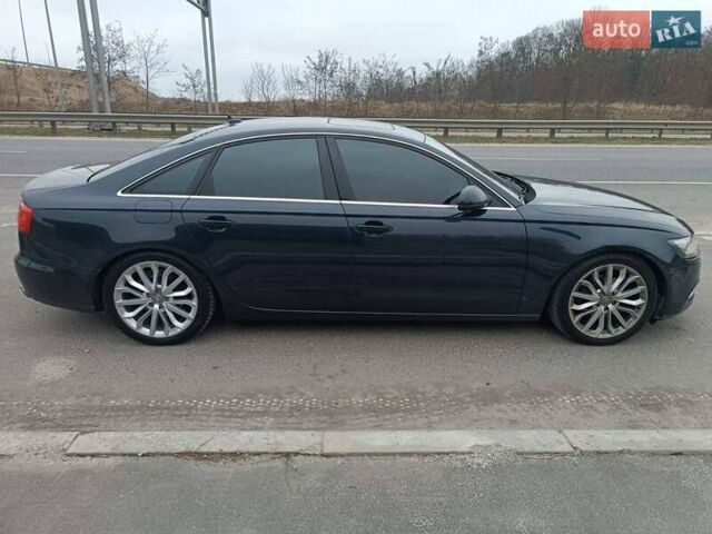 Синий Ауди А6, объемом двигателя 2 л и пробегом 220 тыс. км за 13000 $, фото 1 на Automoto.ua