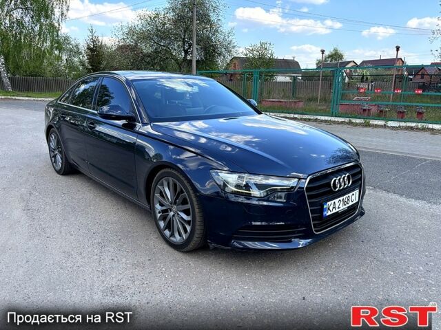 Синий Ауди А6, объемом двигателя 2 л и пробегом 190 тыс. км за 12200 $, фото 1 на Automoto.ua