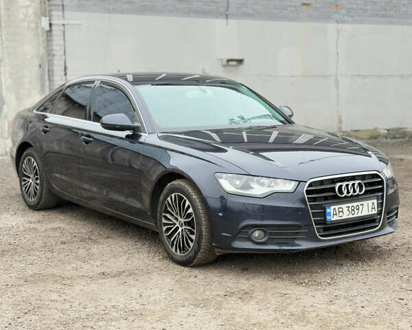 Синий Ауди А6, объемом двигателя 2 л и пробегом 250 тыс. км за 15900 $, фото 1 на Automoto.ua