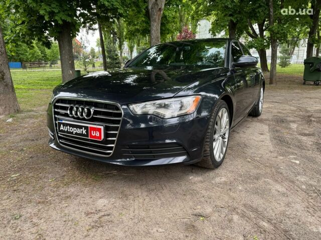Синій Ауді А6, об'ємом двигуна 2 л та пробігом 180 тис. км за 16990 $, фото 1 на Automoto.ua
