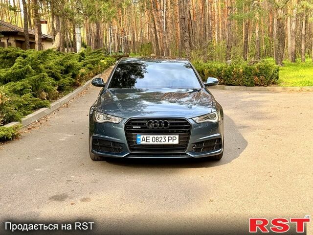 Синий Ауди А6, объемом двигателя 2 л и пробегом 106 тыс. км за 19000 $, фото 1 на Automoto.ua