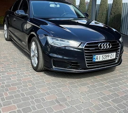 Синий Ауди А6, объемом двигателя 2 л и пробегом 170 тыс. км за 25000 $, фото 1 на Automoto.ua