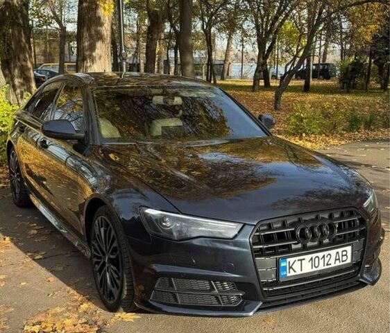 Синий Ауди А6, объемом двигателя 2 л и пробегом 183 тыс. км за 18600 $, фото 1 на Automoto.ua