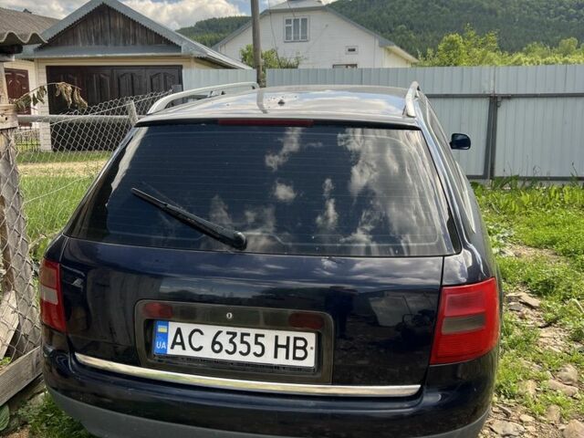 Синий Ауди А6, объемом двигателя 2.4 л и пробегом 240 тыс. км за 3650 $, фото 1 на Automoto.ua