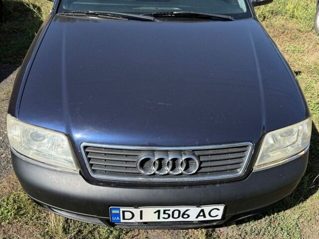 Синий Ауди А6, объемом двигателя 2.4 л и пробегом 394 тыс. км за 3807 $, фото 1 на Automoto.ua