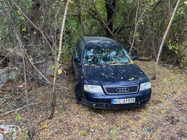 Синій Ауді А6, об'ємом двигуна 2 л та пробігом 326 тис. км за 2257 $, фото 1 на Automoto.ua