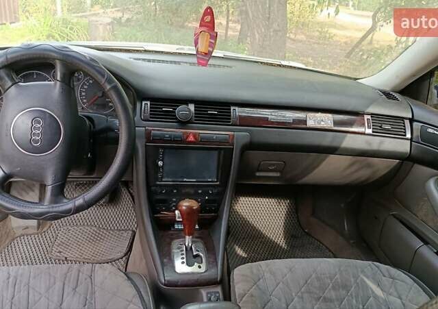Синий Ауди А6, объемом двигателя 2.5 л и пробегом 270 тыс. км за 4300 $, фото 1 на Automoto.ua
