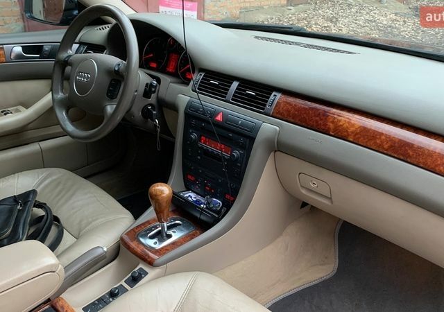 Синий Ауди А6, объемом двигателя 2.39 л и пробегом 305 тыс. км за 6750 $, фото 1 на Automoto.ua