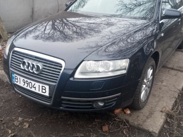Синий Ауди А6, объемом двигателя 2 л и пробегом 370 тыс. км за 7300 $, фото 1 на Automoto.ua