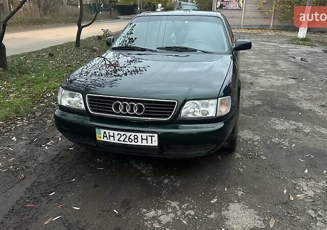 Зеленый Ауди А6, объемом двигателя 2.6 л и пробегом 285 тыс. км за 4000 $, фото 1 на Automoto.ua