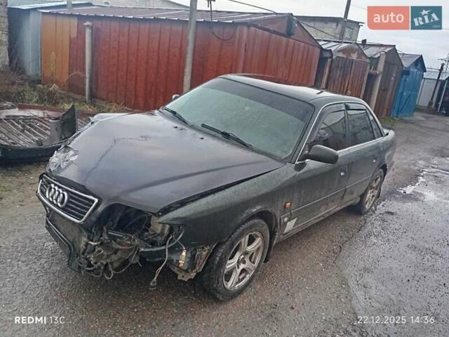 Зеленый Ауди А6, объемом двигателя 2.6 л и пробегом 458 тыс. км за 1500 $, фото 1 на Automoto.ua