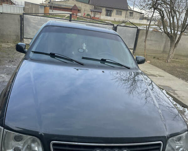 Зеленый Ауди А6, объемом двигателя 2.6 л и пробегом 400 тыс. км за 2999 $, фото 1 на Automoto.ua