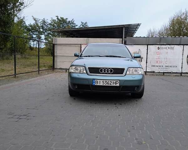 Зеленый Ауди А6, объемом двигателя 2.39 л и пробегом 265 тыс. км за 4600 $, фото 1 на Automoto.ua