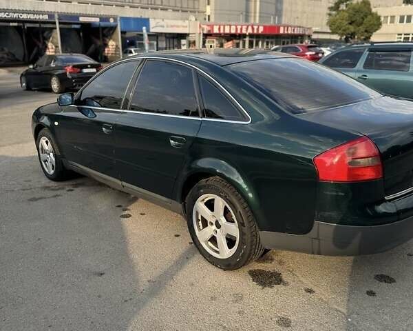 Зеленый Ауди А6, объемом двигателя 2.4 л и пробегом 321 тыс. км за 4900 $, фото 1 на Automoto.ua