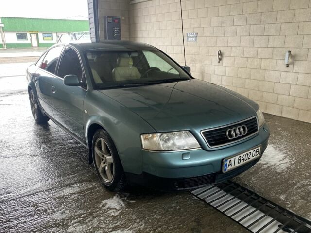 Зеленый Ауди А6, объемом двигателя 1.8 л и пробегом 400 тыс. км за 3300 $, фото 1 на Automoto.ua