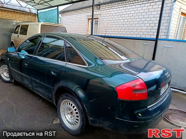 Зелений Ауді А6, об'ємом двигуна 2.4 л та пробігом 313 тис. км за 3999 $, фото 1 на Automoto.ua