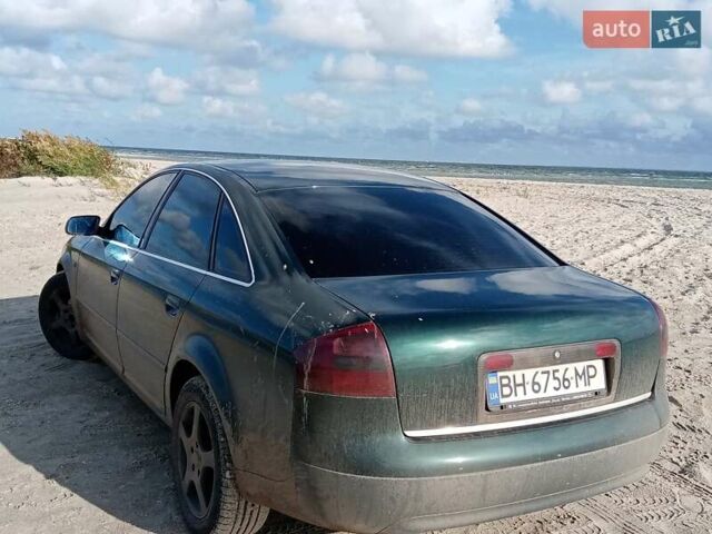 Зеленый Ауди А6, объемом двигателя 2.5 л и пробегом 310 тыс. км за 4000 $, фото 1 на Automoto.ua
