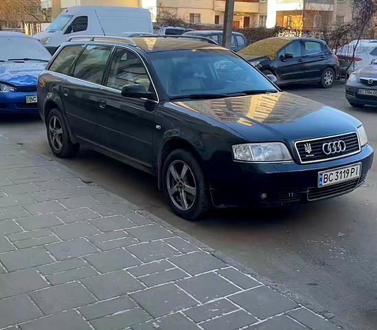 Зеленый Ауди А6, объемом двигателя 2.5 л и пробегом 389 тыс. км за 5000 $, фото 1 на Automoto.ua