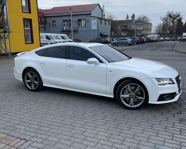 Белый Ауди A7 Sportback, объемом двигателя 3 л и пробегом 135 тыс. км за 25600 $, фото 1 на Automoto.ua