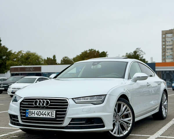 Белый Ауди A7 Sportback, объемом двигателя 3 л и пробегом 155 тыс. км за 26200 $, фото 1 на Automoto.ua