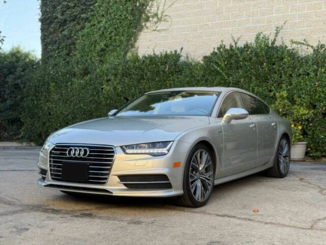 Серый Ауди A7 Sportback, объемом двигателя 3 л и пробегом 77 тыс. км за 7800 $, фото 1 на Automoto.ua