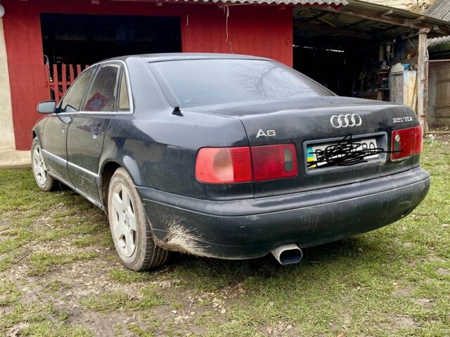 Черный Ауди А8, объемом двигателя 2.5 л и пробегом 329 тыс. км за 5500 $, фото 1 на Automoto.ua