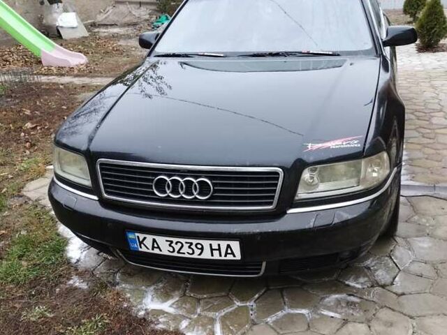 Черный Ауди А8, объемом двигателя 2.5 л и пробегом 430 тыс. км за 4700 $, фото 1 на Automoto.ua