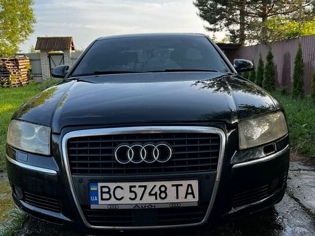 Черный Ауди А8, объемом двигателя 4.2 л и пробегом 350 тыс. км за 4850 $, фото 1 на Automoto.ua
